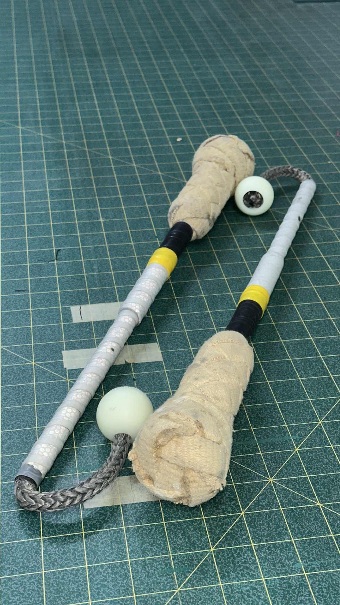 Poi clubs, reflective tape