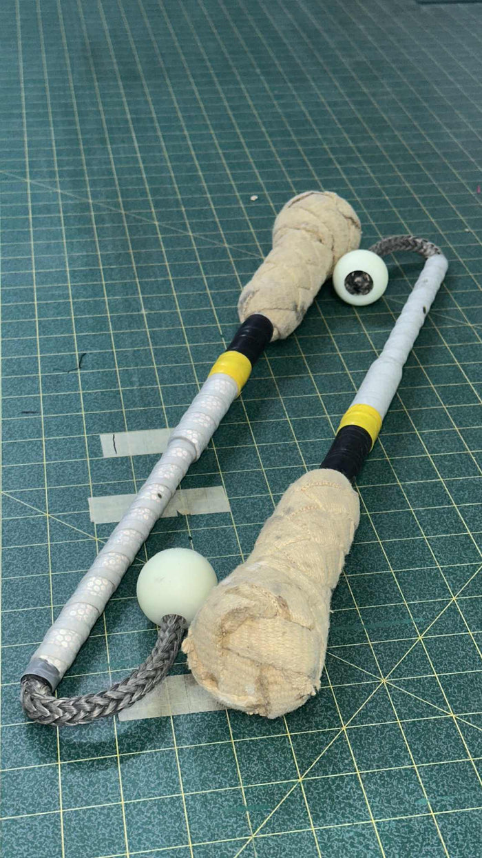 Poi clubs, reflective tape